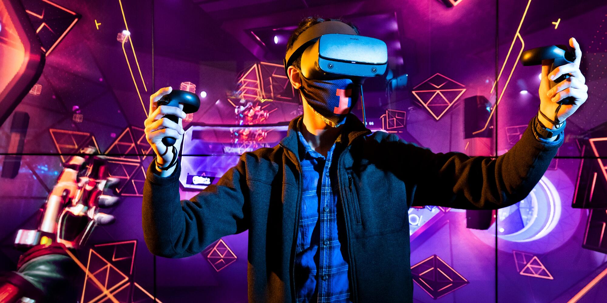A guy wearing a virtual reality gear.