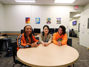 3 Interns at a table